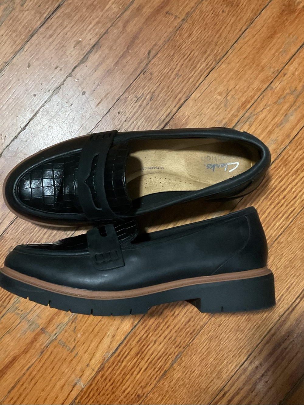 Clarks Black Leather Penny Loafers with Brown Trim
